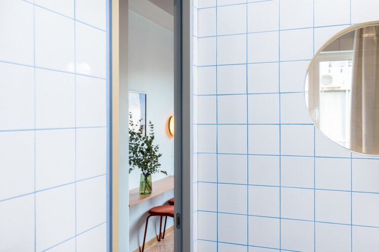Vibrant colors and original mosaic flooring adorn Acre Urban Studios interior in Monastiraki, Athens